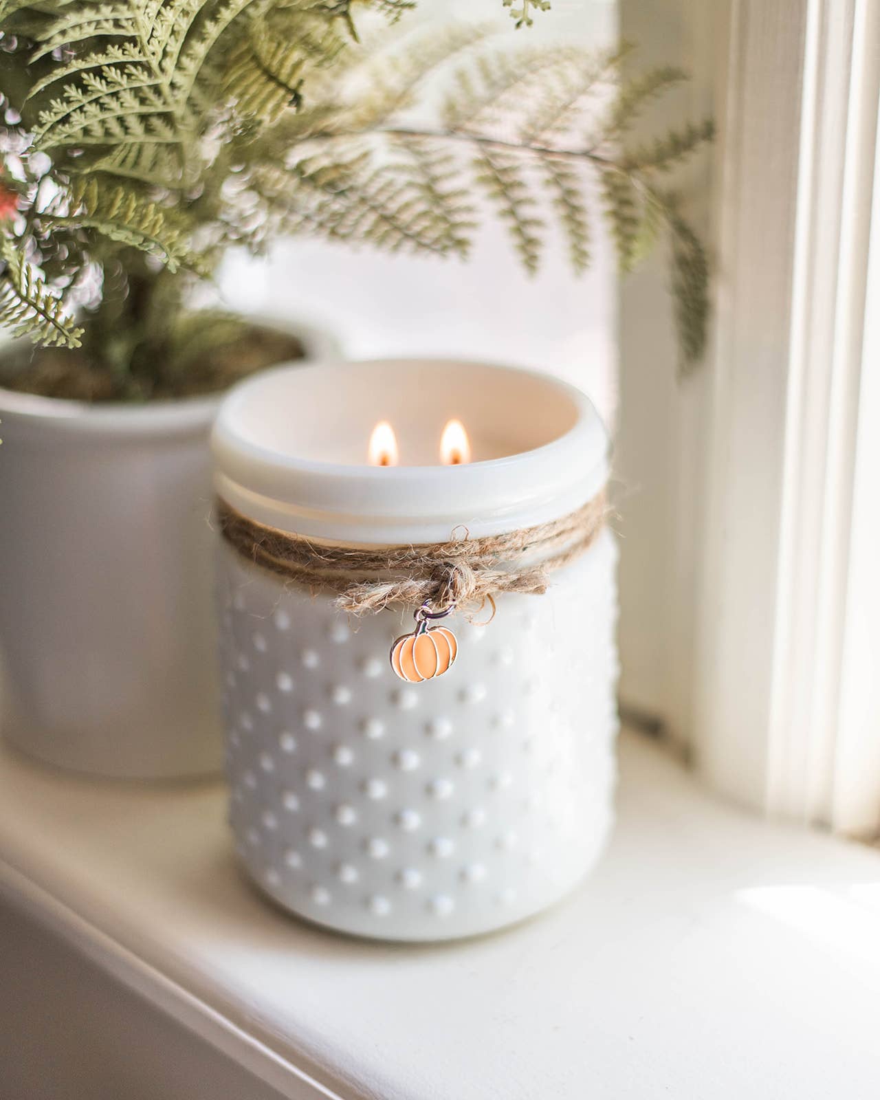 White Hobnail Candle W/Pumpkin Charm
