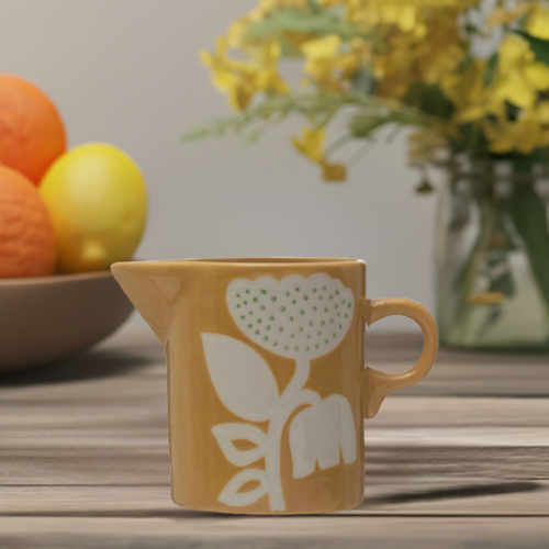 yellow mug with hand painted floral design
